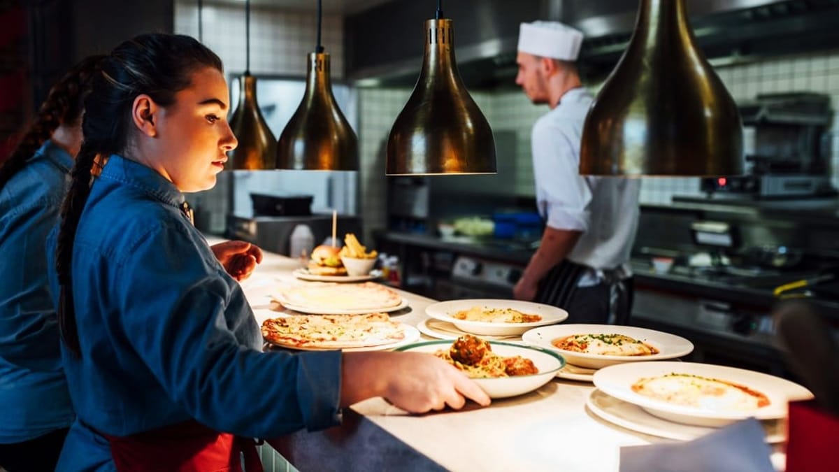 GST intelligence officers conduct raids at seven locations of a eatery chain